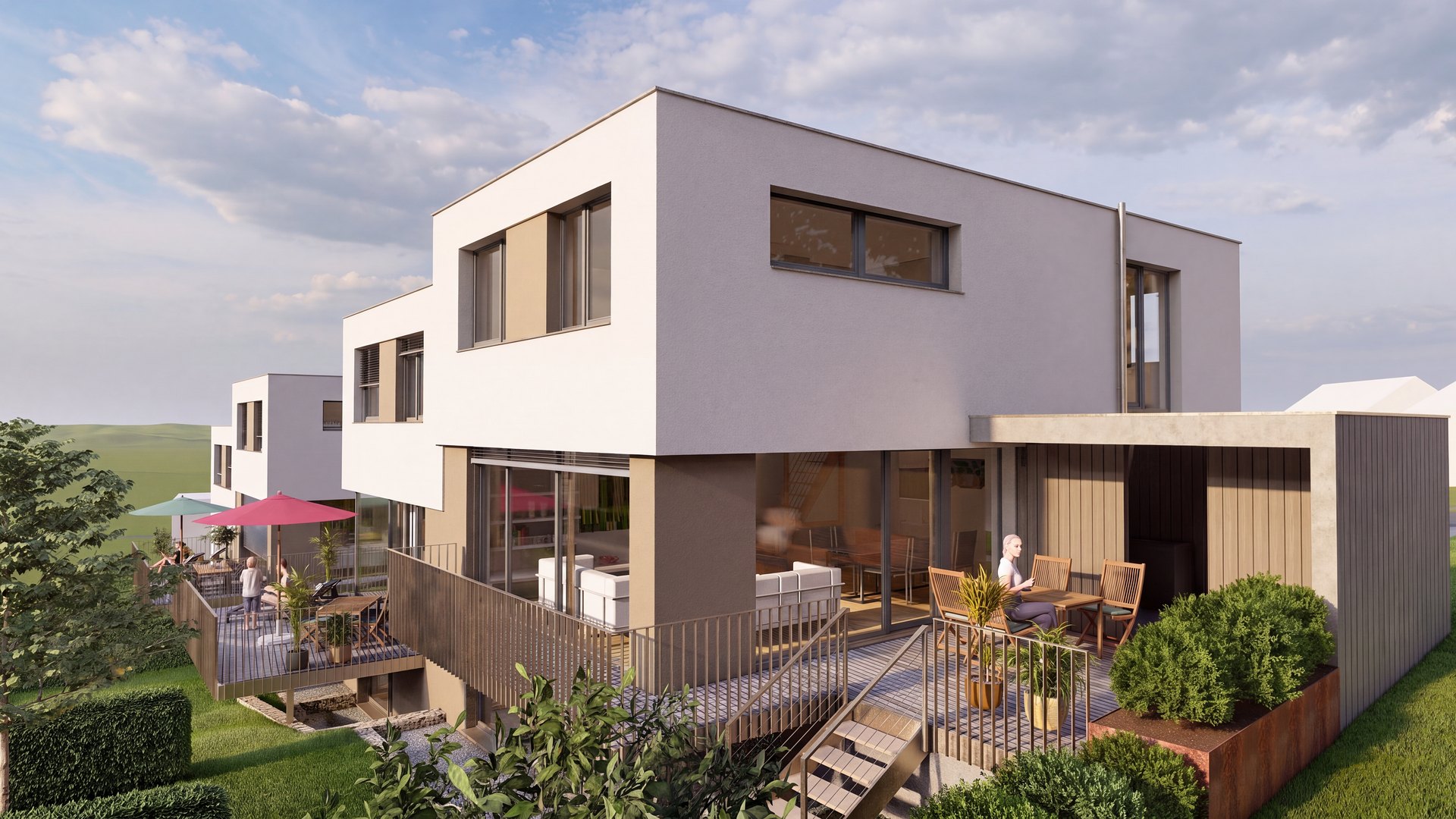 Abendliche Terrasse mit Gästen auf der Gartenseite